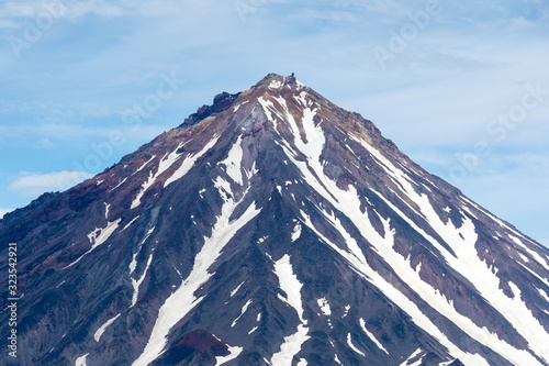 Koryaksky volcano, Kamchatka peninsula, Russia. An active volcano 35 km north of the city of Petropavlovsk-Kamchatsky. The absolute height is 3430 meters above sea level. photo