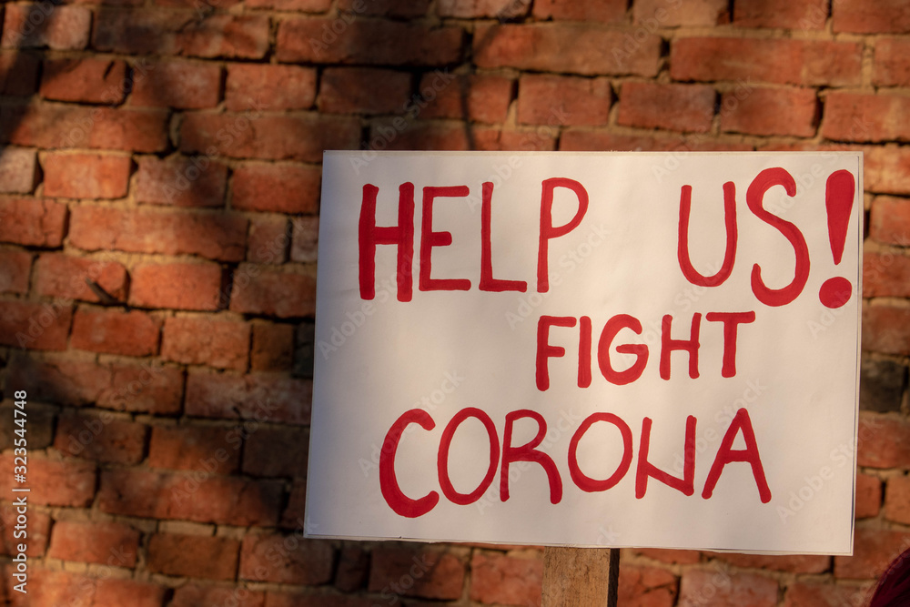 Banner saying  " Help us! Fight Corona" . Protest banner calling governments to help fight corona virus. Corona virus transparent.  People encourage scientists to stop pandemic. - obrazy, fototapety, plakaty 