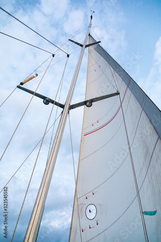 Mast with a sail in the wind