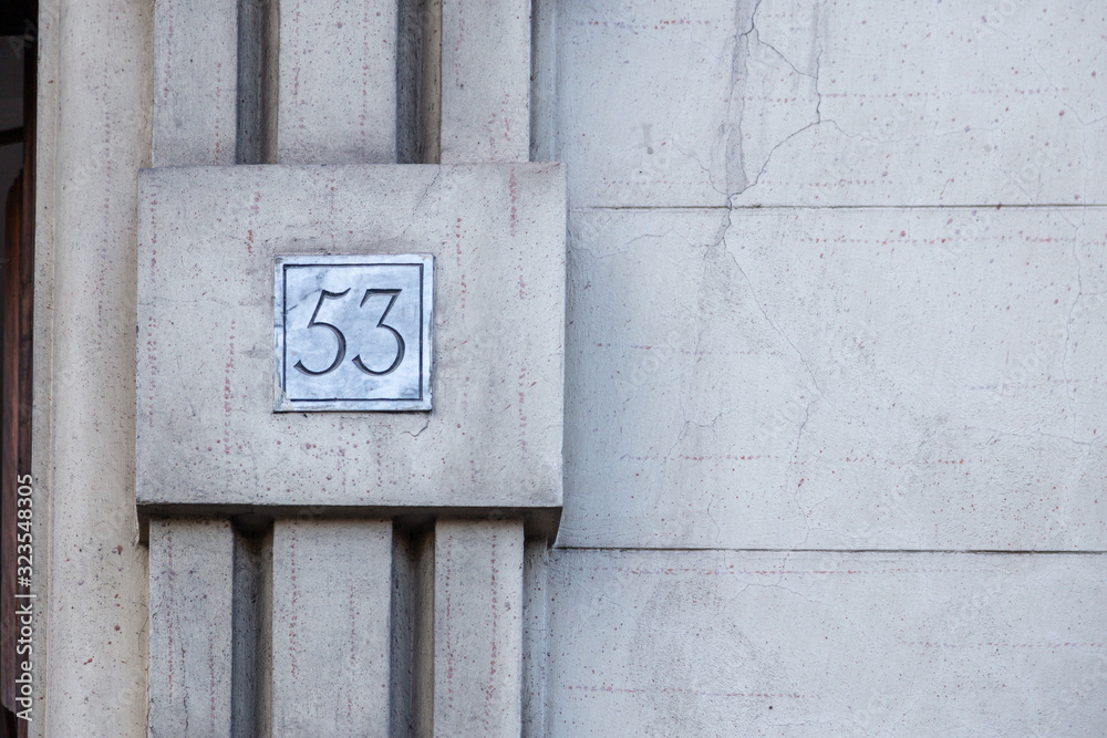 number 53, ancient house number plate on brick wall, Italy number 53, ancient house number plate on brick wall, Italy