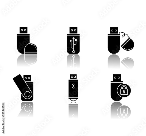 USB flash drive drop shadow black glyph icons set. Compact data storage device. Memory stick. Thumb drive, key. Transferring information. Small gadget. Isolated vector illustrations on white space