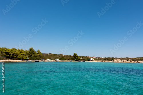 Amazing scenery by the sea in Diaporos island, Sithonia, Chalkidiki, Greece © kokixx
