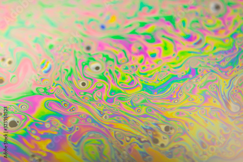 Close up soap bubble background. Psychedelic abstract background