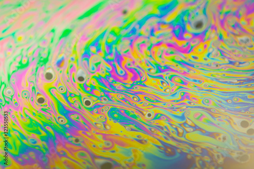 Close up soap bubble background. Psychedelic abstract background © Achira22