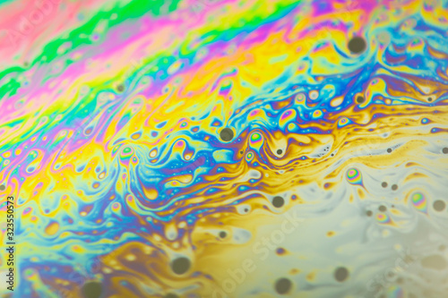 Close up soap bubble background. Psychedelic abstract background