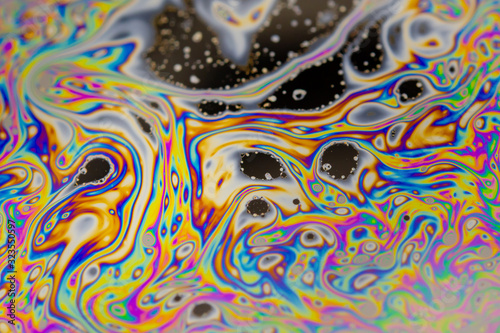 Close up soap bubble background. Psychedelic abstract background
