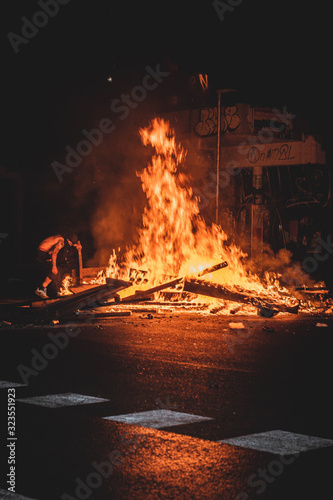  barricade in fire in the city at night