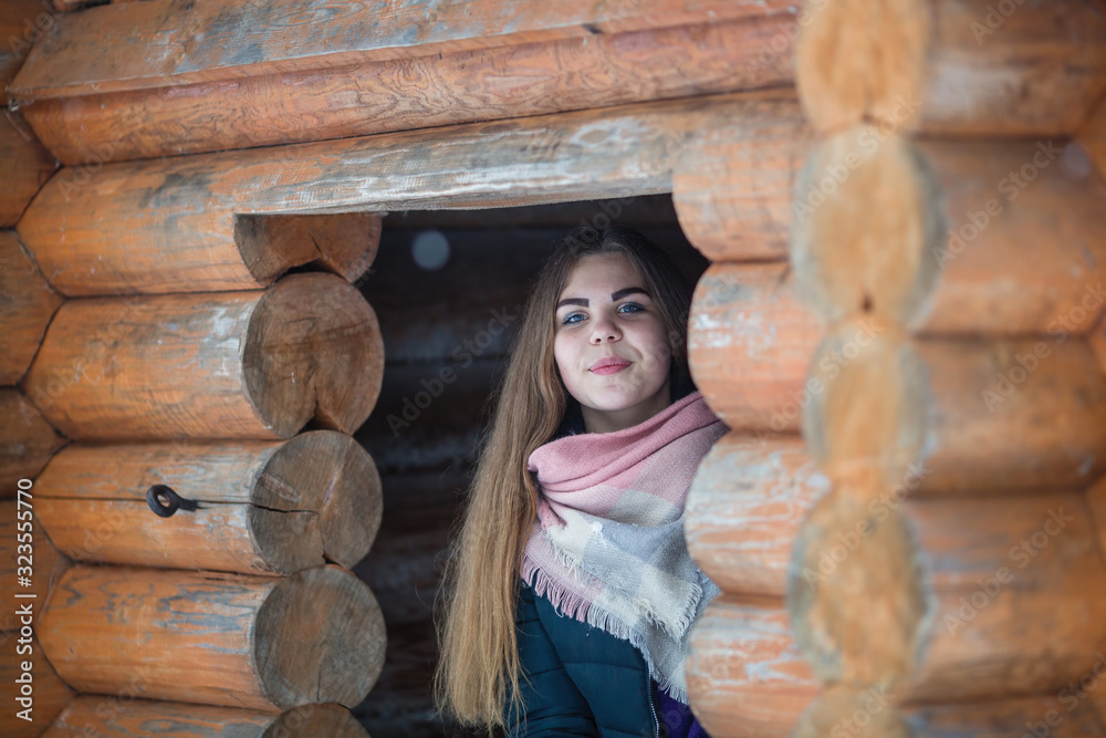 Portrait of young woman outdoors in winter. Portrait of young woman outdoors in winter.