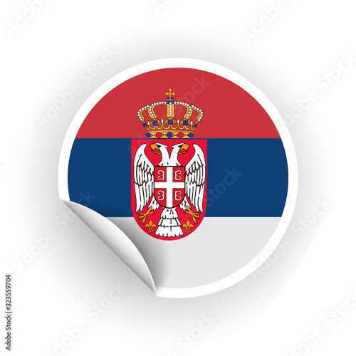 Sticker of Serbia flag with peel off corner isolated on white background. Paper banner or circle curl label sticker with flip edge. Vector color post note for advertising design. photo
