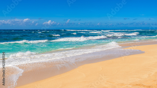 Beautiful beach and tropical sea. Sand and water vacation background.