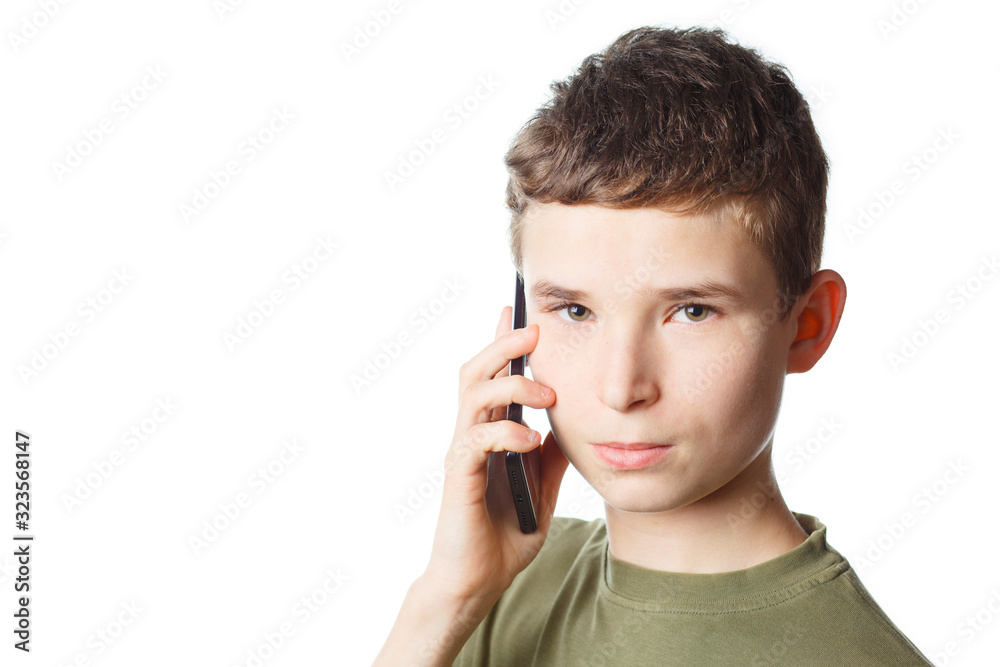Teenager on white background communicates mobile Teenager on white background communicates mobile