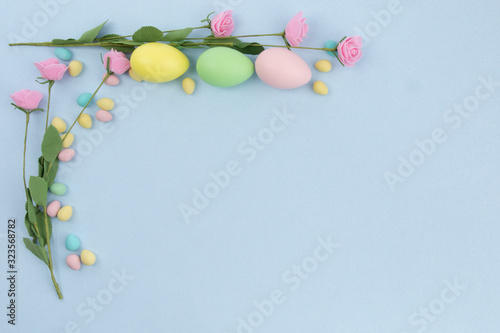 small and large Easter eggs as a border on a background with copy space © SockaGPhoto