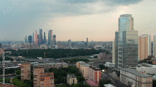 Wallpaper Mural Flying back over the city streets, a large modern business center in the frame, aerial video Torontodigital.ca