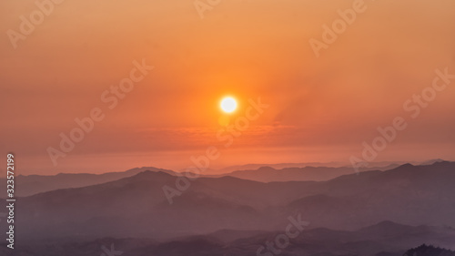 natural landscape scenery of sunrising over mountains photo