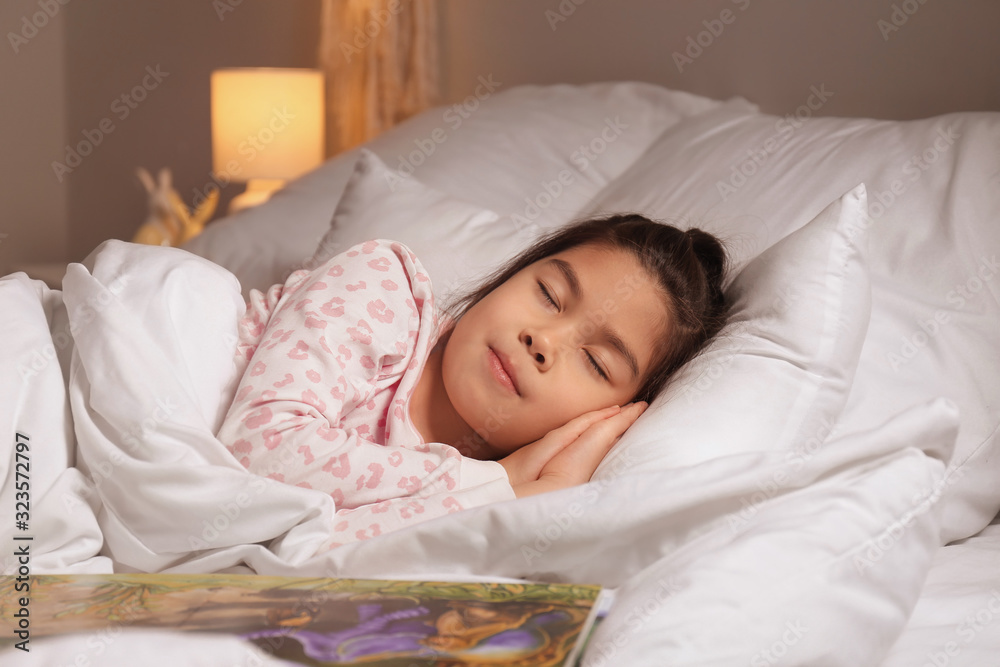 Cute little Asian girl sleeping in bed Cute little Asian girl sleeping in bed