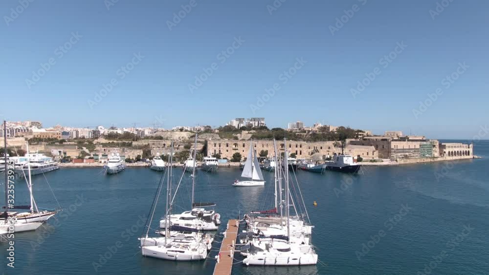 Flight over yachts off the coast of the Mediterranean Sea in Malta, the sea and boats in the frame. Aerial video Flight over yachts off the coast of the Mediterranean Sea in Malta, the sea and boats in the frame. Aerial video
