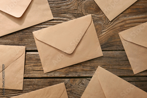 Paper envelopes on wooden background