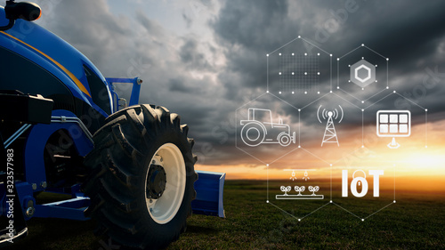 IOT smart farming, agriculture in industry with artificial intelligence and machine learning concept.Automatic tractor using carrier-phase differential GPS. Smart Technology 4.0 or society 5.0
