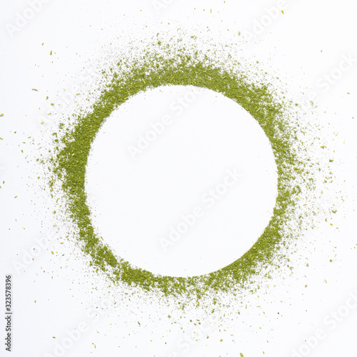 Heap of matcha green tea powder isolated on white background creative flat lay  Organic product from the nature for healthy with traditional style