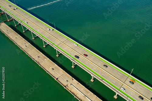 Aerial photo new and old Miami bridge over the bay