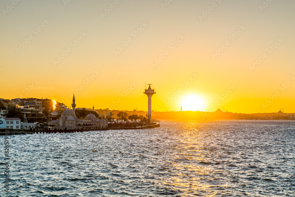 Beautiful seascape of bosphorus strait with golden sunset in Istanbul, Turkey.