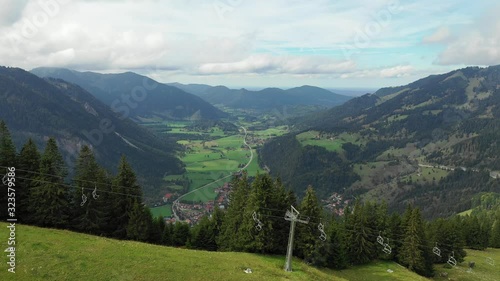 Bayrischzell municipality aerial view, with a view of Osterhofen town. German beautiful nature and green forests, Bavaria, Germany. The village Bayrischzell in mountains of Alps, Bavaria Germany. photo