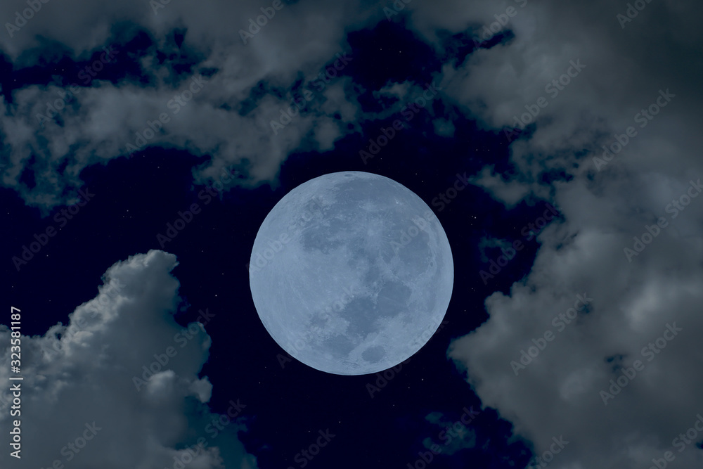 Full moon on night sky with blurred cloud. Full moon on night sky with blurred cloud.