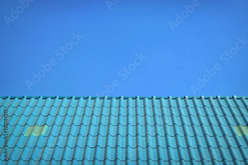 Close up, The Blue Double Roofing Tiles are outdoors. Sky background 