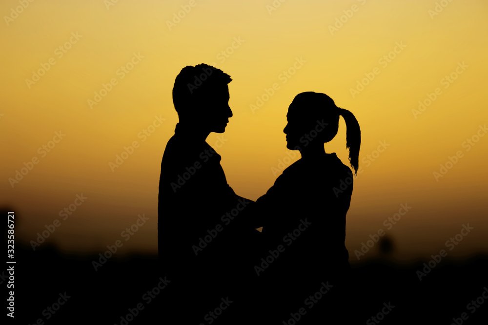 Couple with a silhouette.