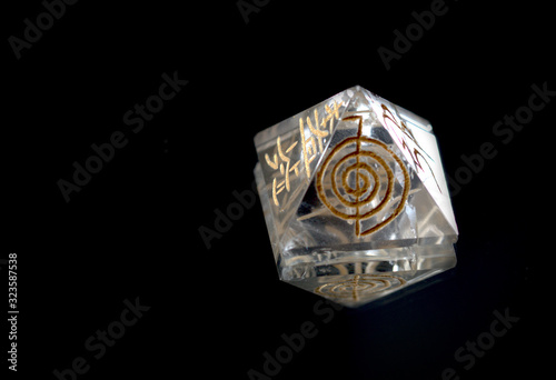 Crystal in Pyramid Shape With REIKI symbols : Cho Ku Rei means Power, Sei Hei ki means Harmony, Hon sha ze sho nen means Distance, Dai ko myo means Master, Raku =completion