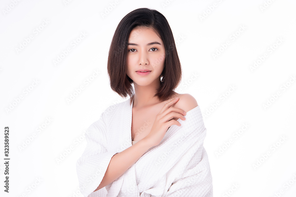 Beautiful Young Asian Woman with Clean Fresh Skin. Face care, Facial treatment, on white background, Beauty and Cosmetics Concept. Beautiful Young Asian Woman with Clean Fresh Skin. Face care, Facial treatment, on white background, Beauty and Cosmetics Concept.