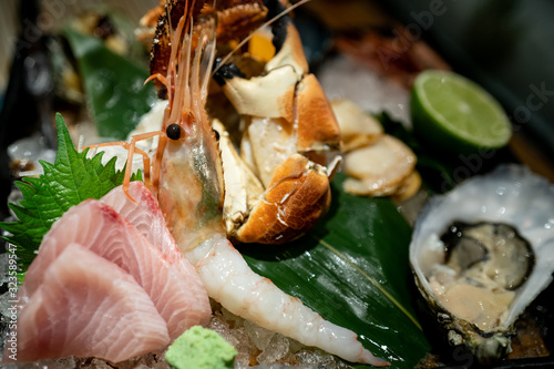 Raw delicious seafood sashimi set crop.