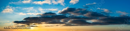 Fantastic dark thunderclouds at sunrise © StepStock