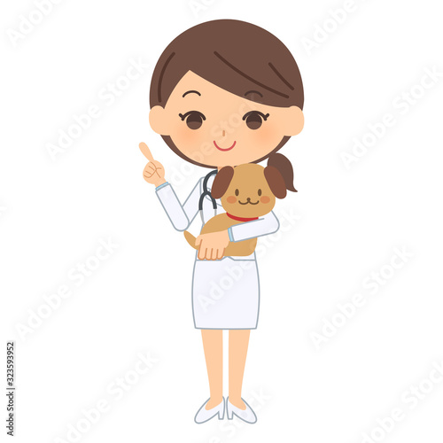 説明をする獣医と犬