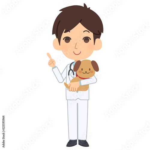 説明をする獣医と犬