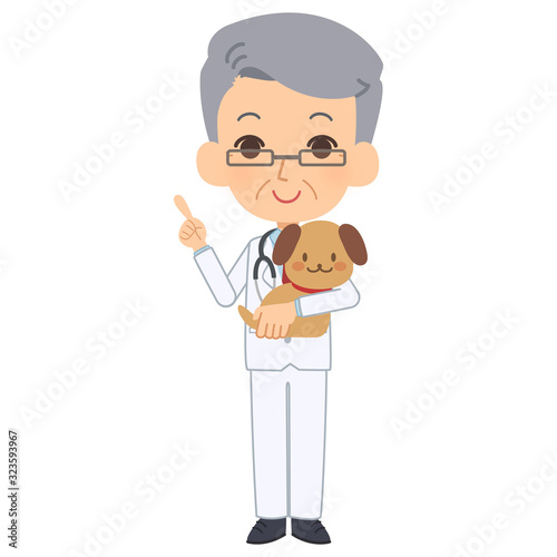 説明をする獣医と犬