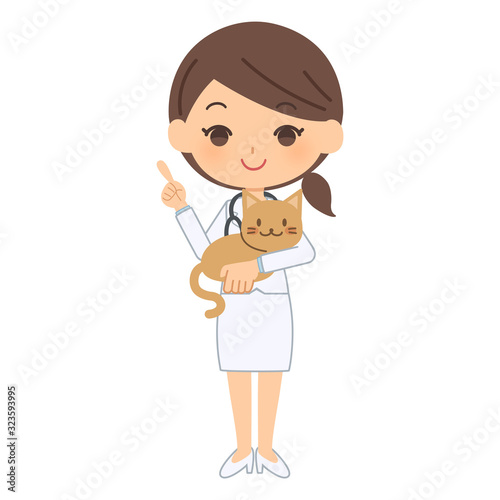 説明をする獣医と猫
