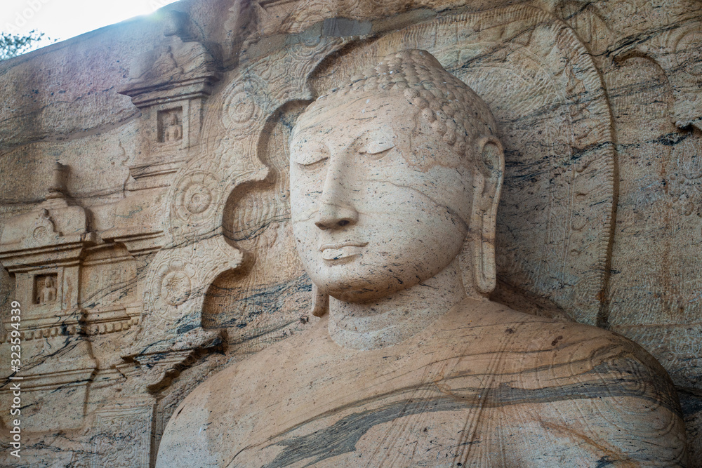 Beautiful face of Buddha at Gal Vihara. This is an unusual feature in