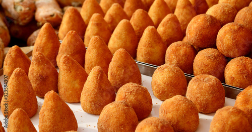 Photos stuffed balls rice is a typical dish of Italy called ARANCINI in