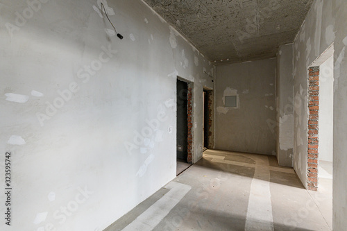 Russia, Moscow- October 17, 2019: interior room apartment rough repair for self-finishing. interior decoration, bare walls of the room, stage of construction