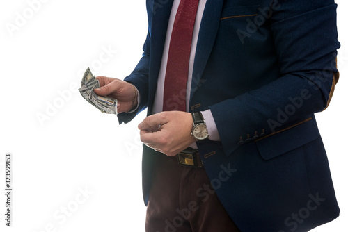 Successful businessman holding american dollar cash money isolated on white background.
