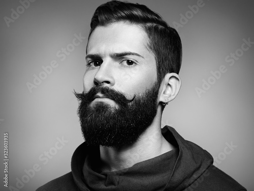 Obraz na plátně Portrait of handsome man with beard and mustache