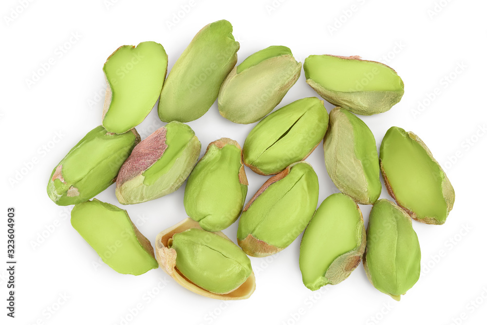 peeled pistachio isolated on white background with clipping path and full depth of field. Top view. Flat lay peeled pistachio isolated on white background with clipping path and full depth of field. Top view. Flat lay