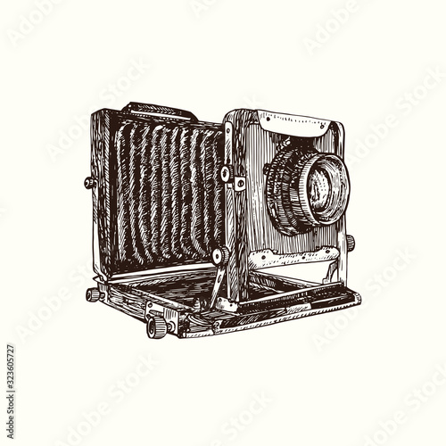 Retro photo camera, hand drawn doodle, drawing in gravure style, sketch illustration, design element