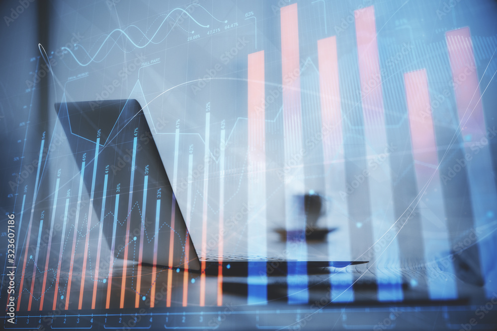 Double exposure of graph and financial info and work space with computer background. Concept of international online trading. Double exposure of graph and financial info and work space with computer background. Concept of international online trading.