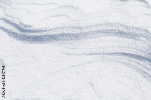 Snow surface. Natural natural background from snow. © Sergei