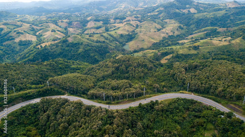 Aerial view of asphalt road on the hill in Phetchabun province, Thailand, Top of view highway road north in Thailand