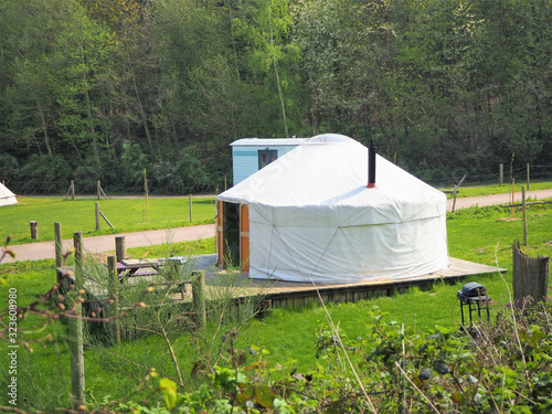 A yurt in a field