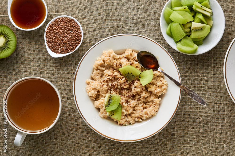 Oatmeal porridge with flaxseeds and kiwi Oatmeal porridge with flaxseeds and kiwi