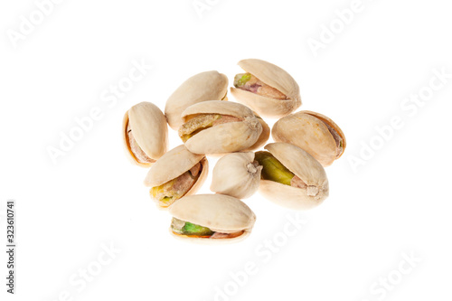 Salted pistachios nuts isolated on white background. Healthy snack.